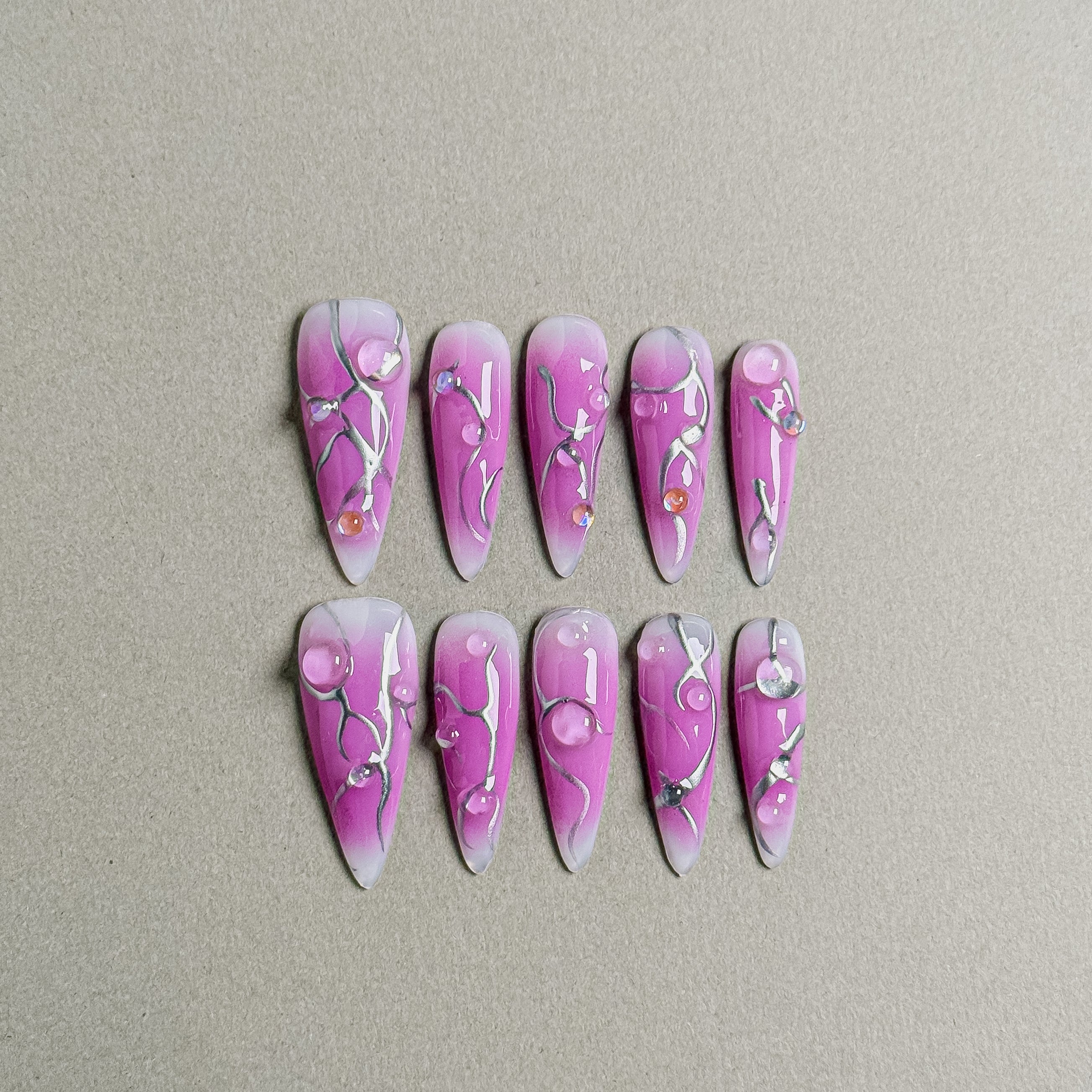 Gorgeous Gentle Monster press on nails with a mesmerizing purple gradient and unique crystal embellishments, featuring Nail art designs and Rhinestone nails, perfect for Party nails