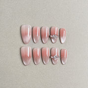 A set of "My Day" press - on nails with a soft pink gradient and glitter, accentuated by elegant rhinestone embellishments on two nails, ideal for adding a touch of glamour to wedding - themed nail styles.