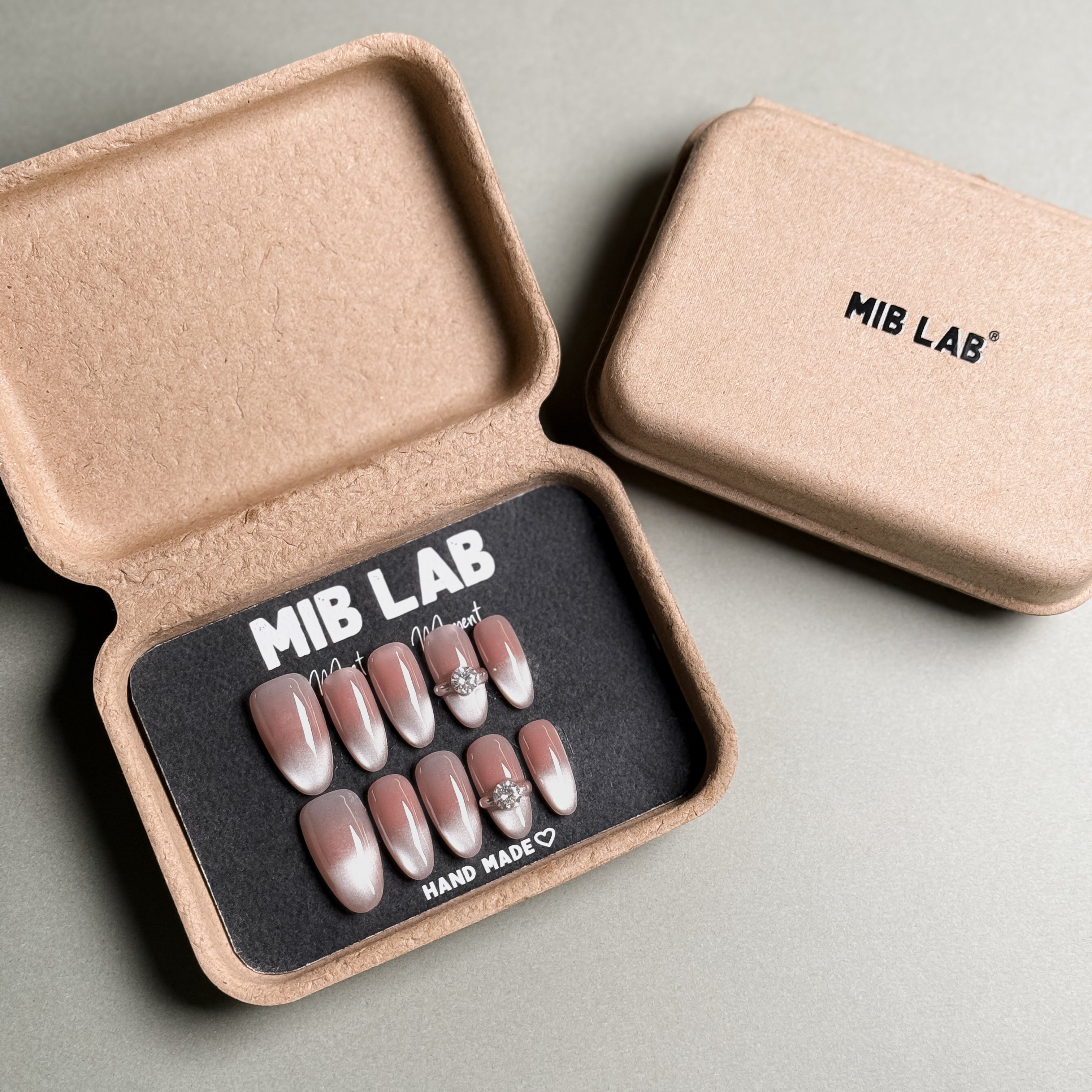 MIBLAB's Rhinestone nails in French tip nails style, packaged in eco-friendly box. Features nail accessories with subtle pink gradient. Ideal for wedding nails or party nails, showcasing luxury press on nails. Offers handmade press on nails with professional nail art detail.