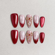 Set of reusable press-on nails in red and nude pink with gold glitter accents, MIBLAB Last Christmas collection Geneva.