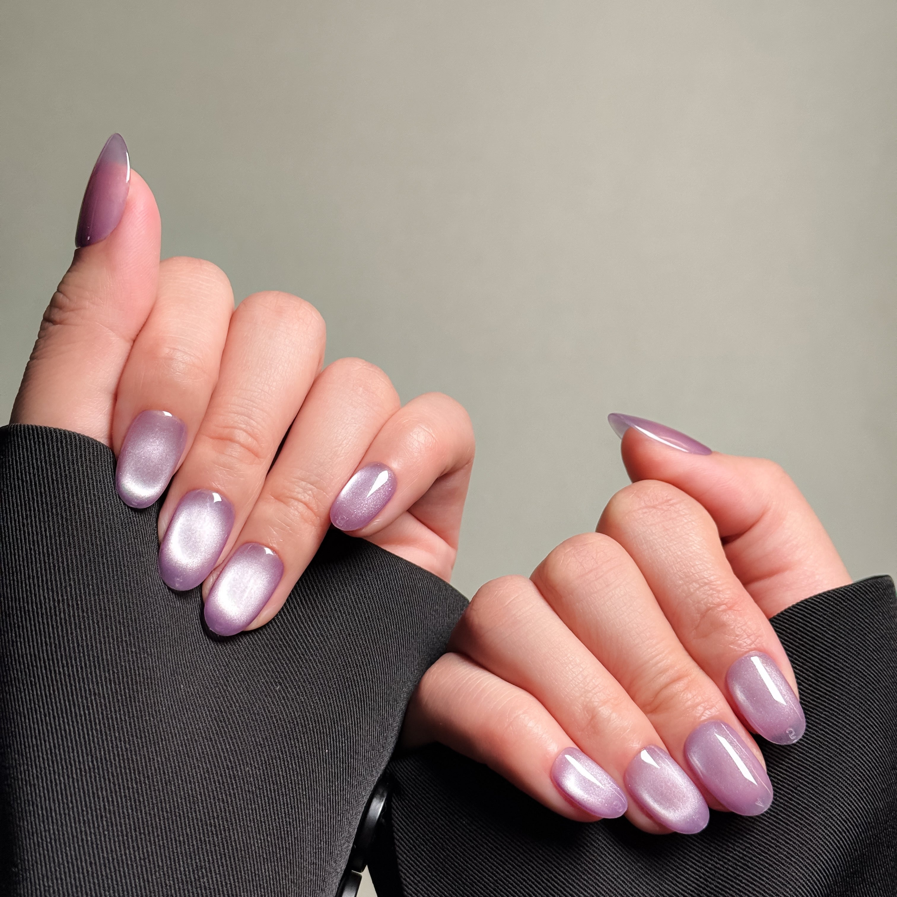 Elegant Almond nails featuring a soft purple hue with a subtle cat-eye effect. These Custom press on nails offer a sophisticated and modern look, perfect for Everyday nails with a touch of elegance. The smooth, glossy finish and subtle shimmer make them ideal for both casual and formal occasions. Ideal for those seeking Luxury press on nails that are both stylish and versatile.