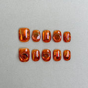 She Is Fire : faux ongles réutilisables ambre orangé translucide, press on nails premium, finition brillante style écaille.